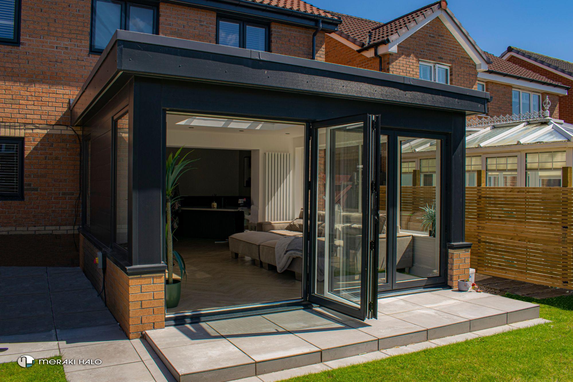Garden room extension with open bifold doors